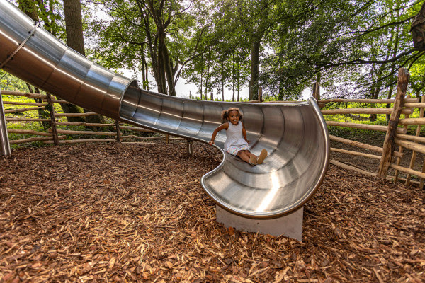 Child on slide at Skelf Island